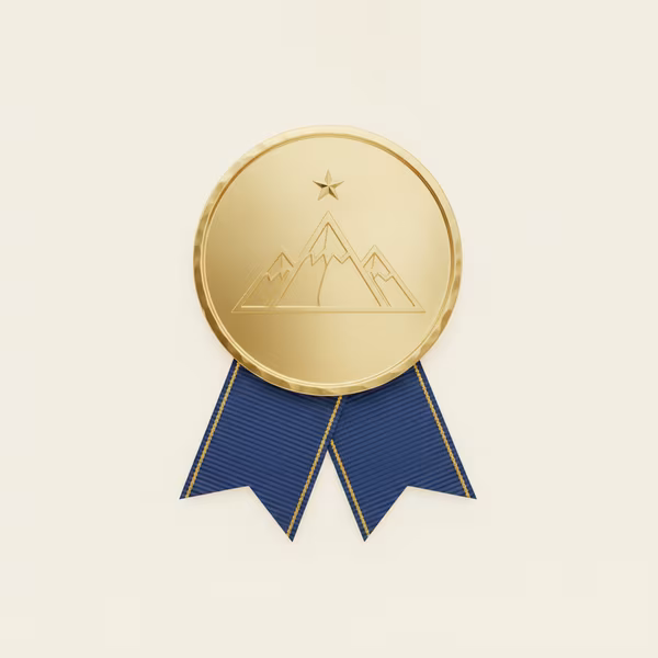 Gold membership badge with three peaks and star